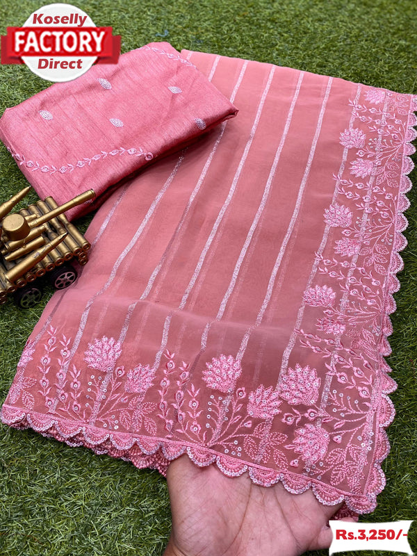 Pink Georgette Weaving And Embroidered Partywear Saree