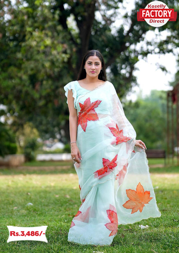 Sky Blue Hand Printed And Handworked Organza Partywear Saree