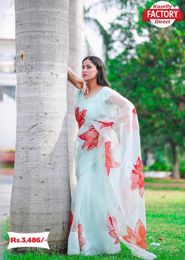 Sky Blue Hand Printed And Handworked Organza Partywear Saree